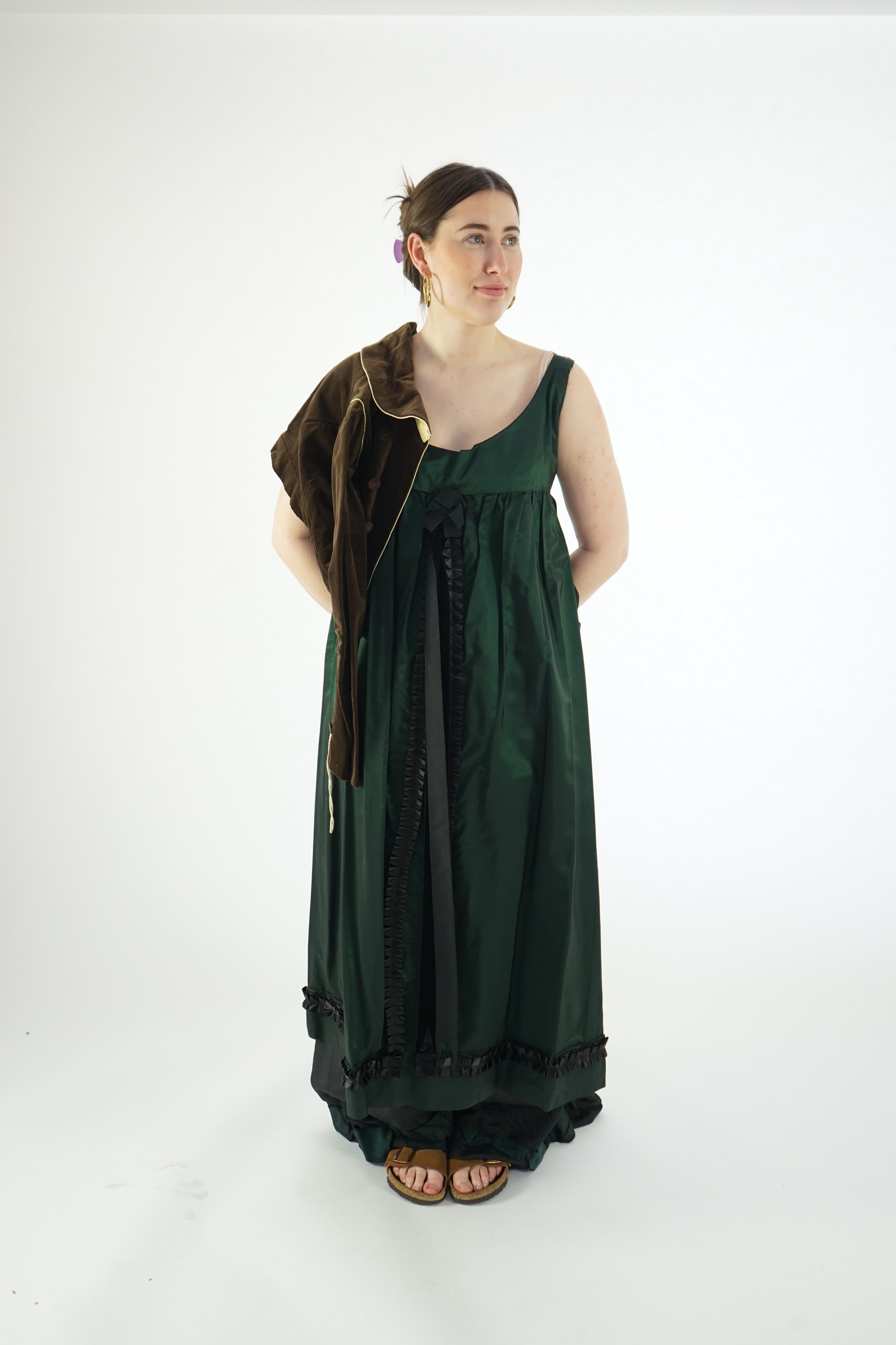 Two lady's Regency style day dresses (1 x dark green taffeta dress with brown short jacket and 1 x bottle green fine cord day dress and short matching jacket)., Ex Carl Rosa Opera Company.